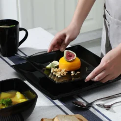 Vancasso Tafelservice »SOHO« 16-tlg. Porzellan Teller Set, Kombiservice Tafelset Mit Kaffeetassen, Müslischalen, Schwarz -Esstisch Lieferungen Rabatte f41fcc1da29a1a916ab12df182c42ce8